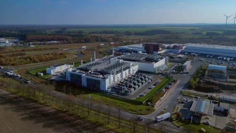 Datacenter building global cloud computing. Spectacular aerial view flight drone Stock Footage 321350673