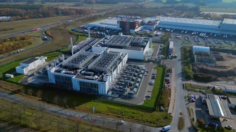Datacenter building global cloud computing. Beautiful aerial view flight drone Stock Footage 321350825