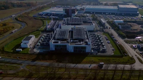 Datacenter exterioir computing infrastructure. Fantastic aerial view flight Stockbeeldmateriaal 321268223