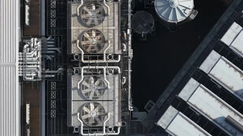 Datacenter rooftop cooling system ventilators spinning Stock Footage 340962300