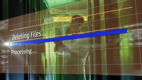 Datacenter tech tapping tablet watching projected progress bar and pointing Stock Footage 332591863