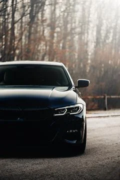 Datail on front of the car with lights on Stock Photos