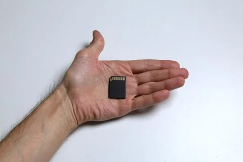 Data,technology,close-up,flash,memory card,hand,security,human hand,part of,smal Stock Photos