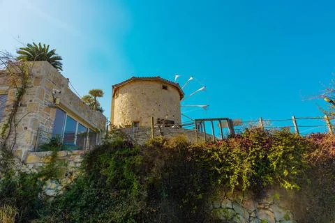 DATCA, MUGLA, TURKEY: The old Turkish windmill Datca Vineyard, now a cafe and Stock Photos