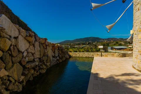 DATCA, MUGLA, TURKEY: The old Turkish windmill Datca Vineyard on a sunny day, Stock Photos