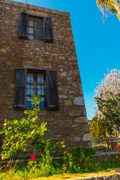 DATCA, MUGLA, TURKEY: View of Eski Datca street with old stone houses. Stock Photos