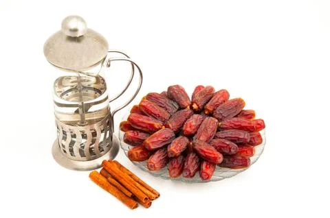 Date and cinnamon isolated Foto stock
