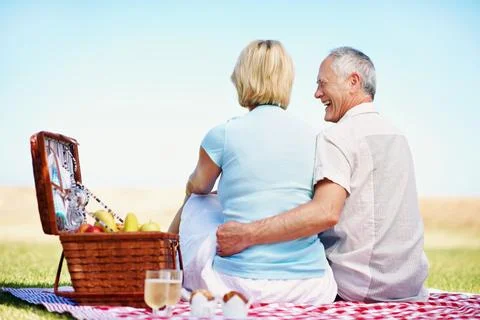 Date, back and picnic with old couple in nature for bonding, connection and Stock Photos