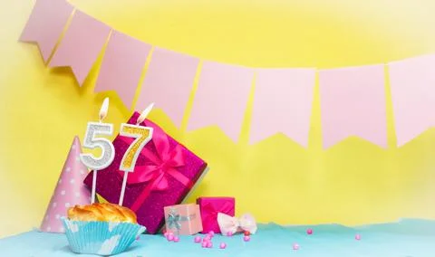 Date of birth with cake and number  57. Colorful card happy birthday for a .. Stock Photos