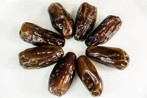 Date. dried dates on a white background. dried fruits Stock Photos