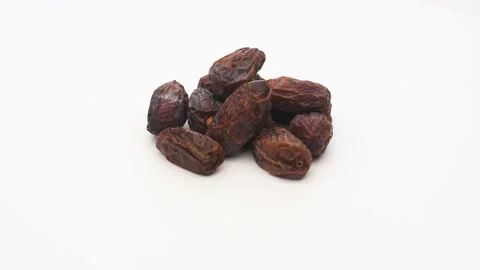 Date Fruit on White Background. Rotating on Turn Table. Vídeo Stock 153138531