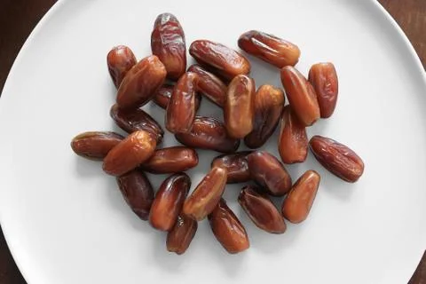 Date fruits on the table Stock Photos