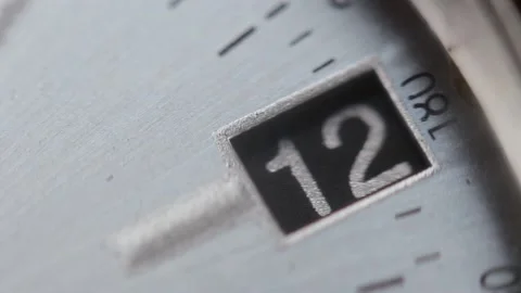 Date indicator changing 12 to 13 on a watch Stock Footage 146646038