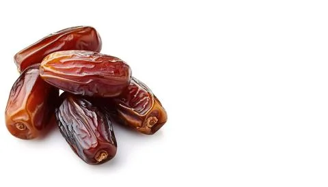 A date or dates are large and very wrinkly, with a darker purplish hue. sof.. Stock Photos