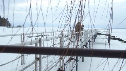 Date on the pier. Winter and romance Stock Footage 129094674
