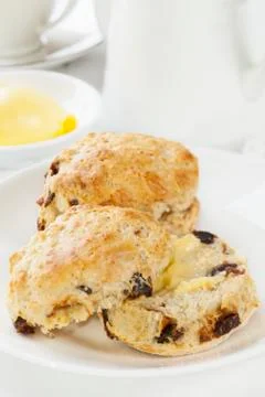 Date scones with butter Foto stock