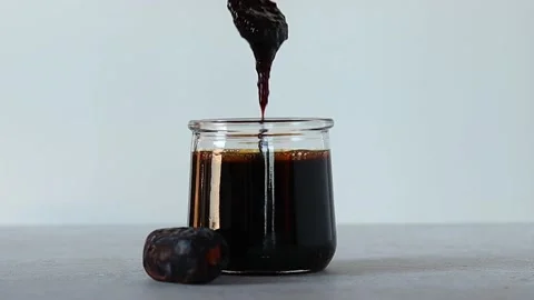 Date syrup Stockbeeldmateriaal 234439364