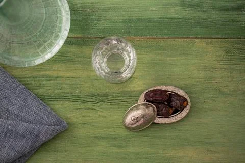 Date is on the table with water Stock Photos