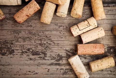 Dated wine bottle corks on the wooden background Dated wine bottle corks o... Stock Photos
