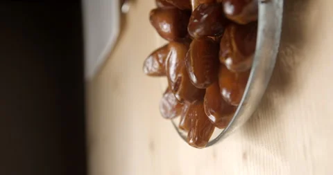 Dates and milk, breaking fast during ramadan, studio vertical 4K Stock Footage 264874432