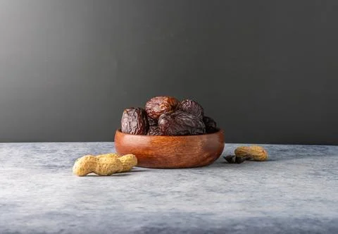 Dates and peanuts. Stock Photos