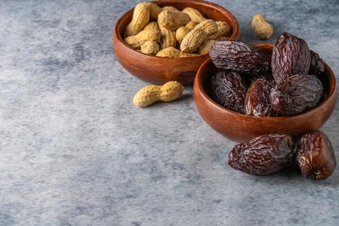 Dates and peanuts. Stock Photos
