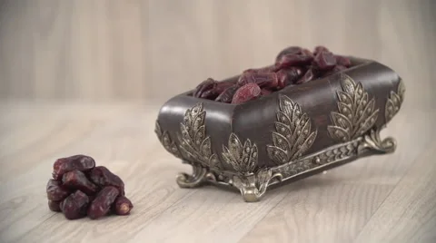 Dates in antique container. Stock Footage 54484632