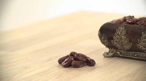Dates in antique container. Stock Footage 54484793