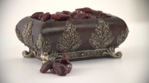 Dates in antique container. Stock Footage 54485084