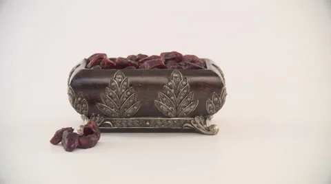 Dates in antique container. Stock Footage 54486058