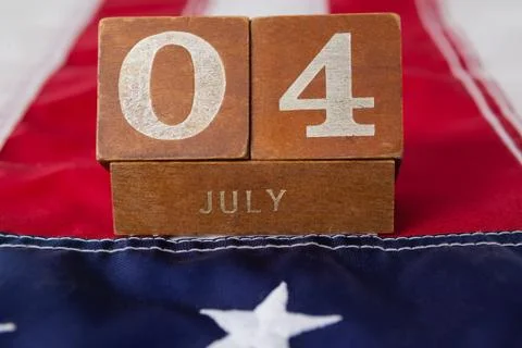 Dates blocks on American flag with 4th july theme Foto stock