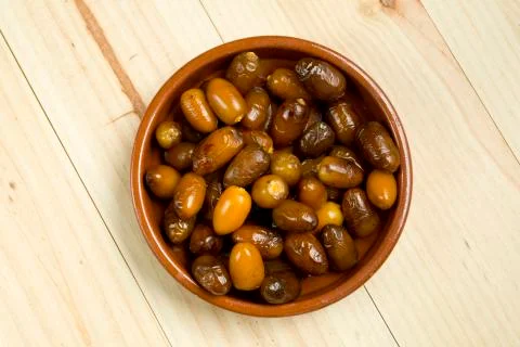 Dates in a clay pot. Stock Photos