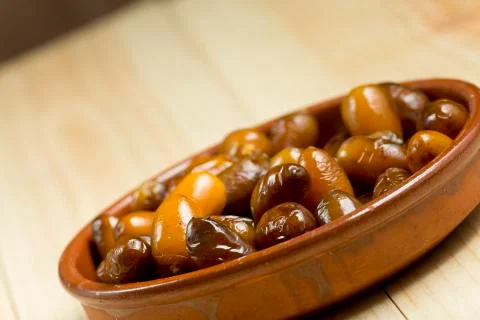 Dates in a clay pot. Stock Photos