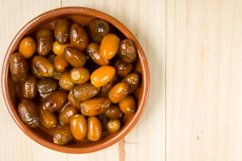 Dates in a clay pot. Stock Photos