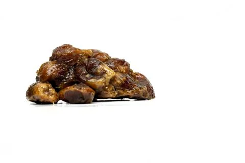 Dates coated with melted jaggery Stock Photos