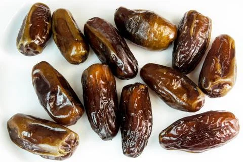 Dates. dried dates on a white background. dried fruits Stock Photos