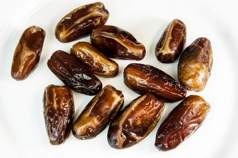 Dates. dried dates on a white background. dried fruits Stock Photos