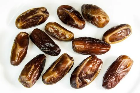 Dates. dried dates on a white background. dried fruits Stock Photos