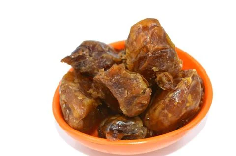 Dates fruit bowl Stock Photos