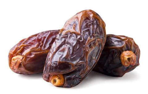 Dates fruit close-up on a white background. Stock Photos