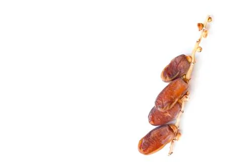 Dates fruit isolated on a white background. Top view. Flat lay pattern. Stock Photos