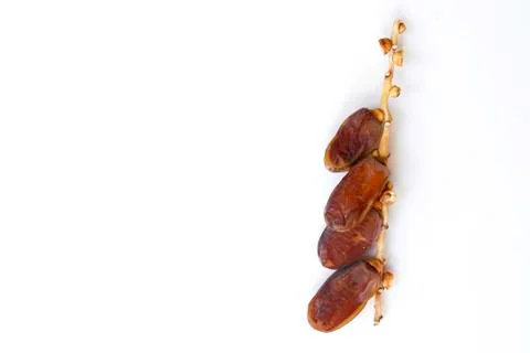 Dates fruit isolated on a white background. Top view. Flat lay pattern. Stock Photos
