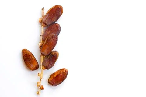 Dates fruit isolated on a white background. Top view. Flat lay pattern. Stock Photos