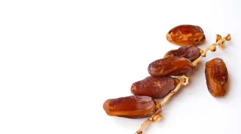 Dates fruit isolated on a white background. Top view. Flat lay pattern. Stock Photos