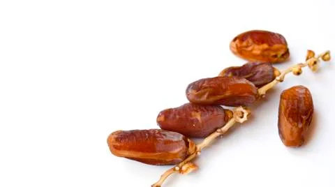 Dates fruit isolated on a white background. Top view. Flat lay pattern. 스톡 사진