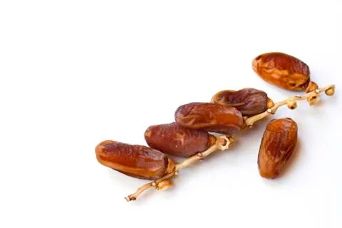 Dates fruit isolated on a white background. Top view. Flat lay pattern. Stock Photos