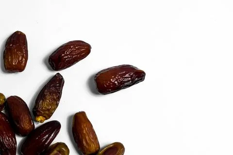 Dates fruit on isolated white background and copy space Stock Photos
