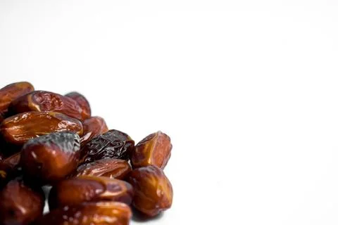 Dates fruit on isolated white background and copy space Stock Photos