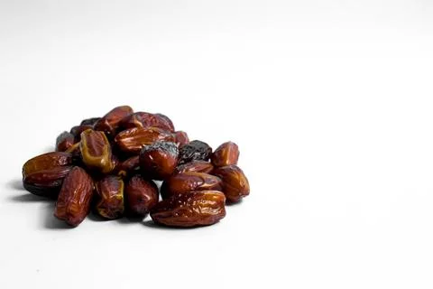 Dates fruit on isolated white background and copy space Stock Photos