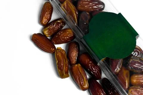 Dates fruit in plastick package with blank green label for product mockup Stock Photos